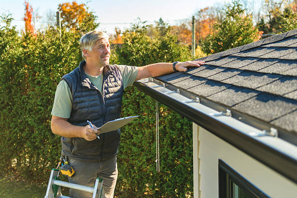Professional Roof Inspection technician working in Keego Harbor, MI